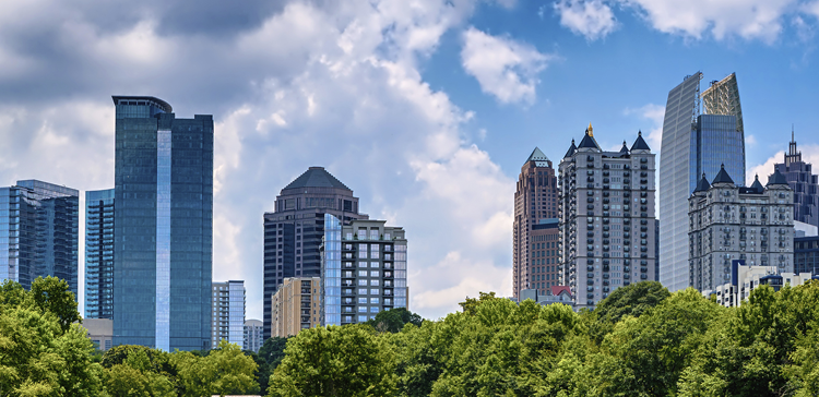 Atlanta Skyline with a blue cloudy sky in the background
